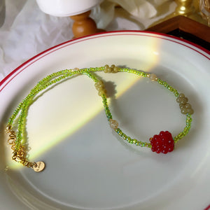 Cherry beaded necklace, front view showing the cherry bead design