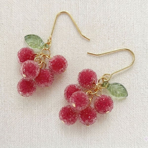 Detailed view of the silver-plated wire construction on handmade fruit cluster earrings