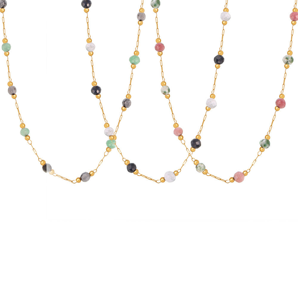 Double layer necklace styled in a flatlay
