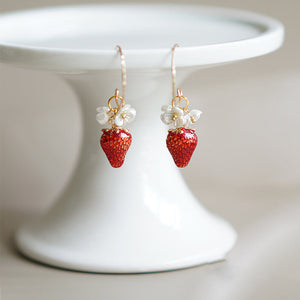 Strawberry earrings showing the hook closure detail