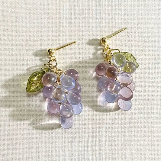 Handmade Czech glass earrings with light purple translucent grape beads and gold leaf detailing, nature‑inspired bohemian jewelry for women