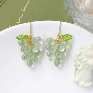 Sweet grape drop earrings with green leaf, angled view – CSOMALL handmade glass fruit jewelry
