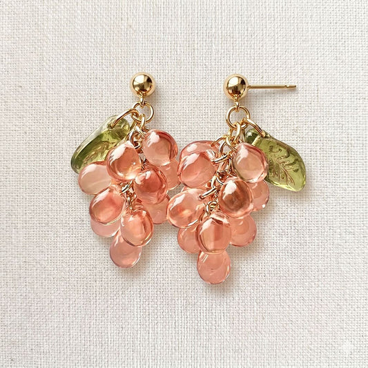 Handcrafted_vibrant_Czech_glass_grape_dangle_earrings_on_a_clean_white_background