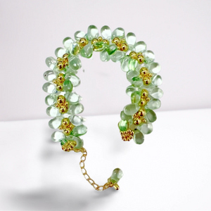 Green glass water drop bracelet, side view showing the water drop design
