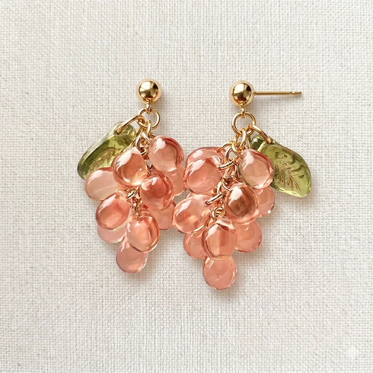 Handmade Czech glass earrings with translucent pink grape beads and green leaf accents, nature‑inspired bohemian jewelry for women