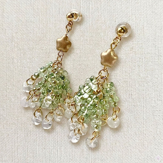 Pair of handmade Czech glass Christmas tree earrings featuring tiered green beads and a gold star topper